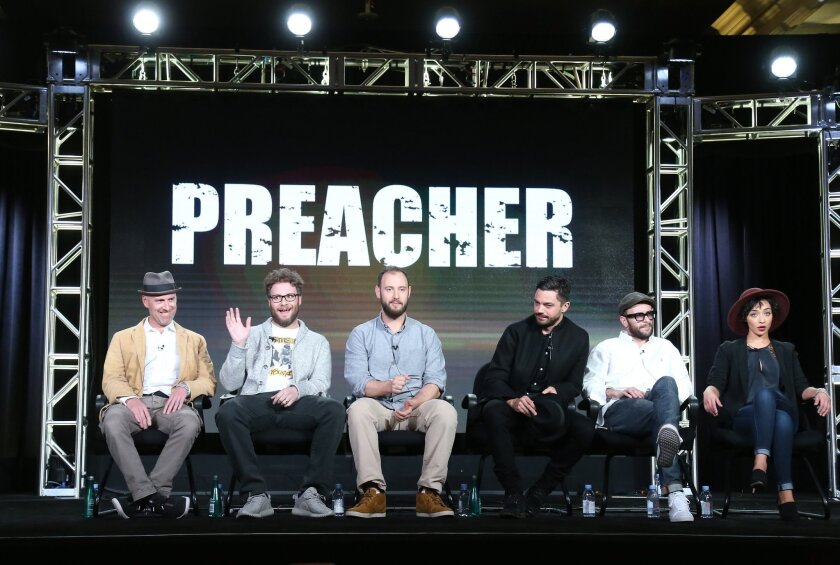 Executive producers Sam Caitlin, Seth Rogen and Evan Goldberg and actors Dominic Cooper, Joseph Gilgun and Ruth Negga speak onstage during the "Preacher" panel at the 2016 Television Critics Assn.