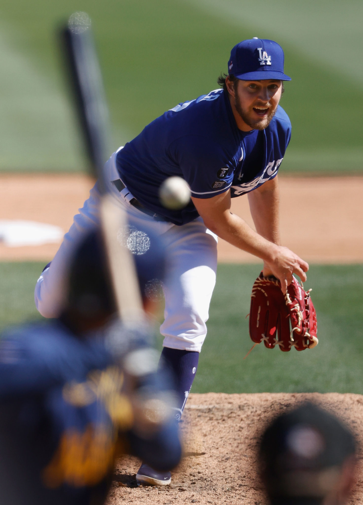 Dodgers starting pitcher Trevor Bauer throws against the Milwaukee Brewers on March 16.