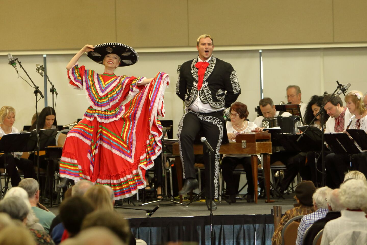 The Los Angeles Balalaika Orchestra plays as Larissa Nazarenko and Tyler Worth dance to a traditional Mexican song