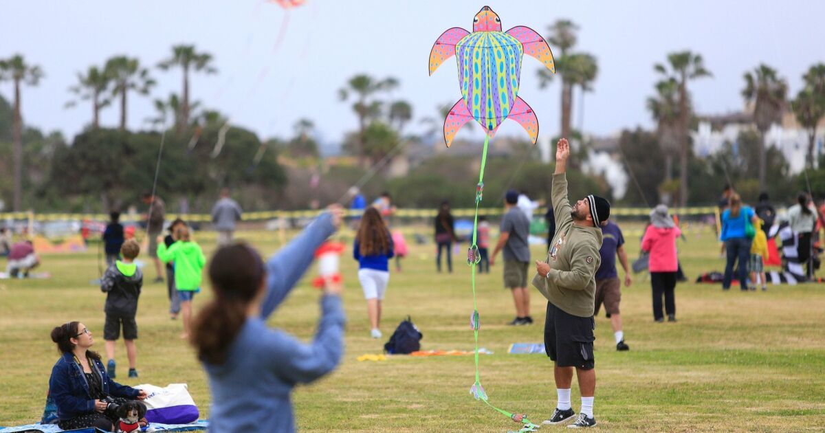 Building and flying kites at annual OB Kite Festival The San Diego