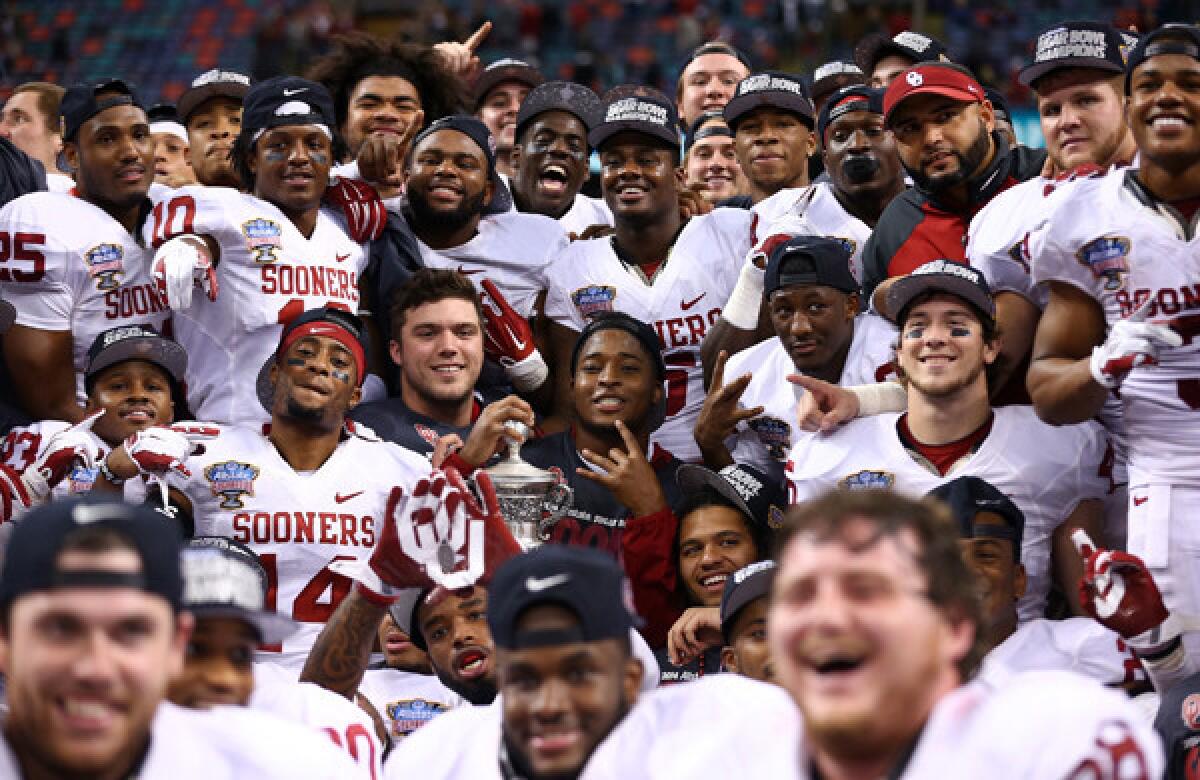 Oklahoma players celebrate their 45-31 upset victory over Alabama in the Sugar Bowl on Thursday.