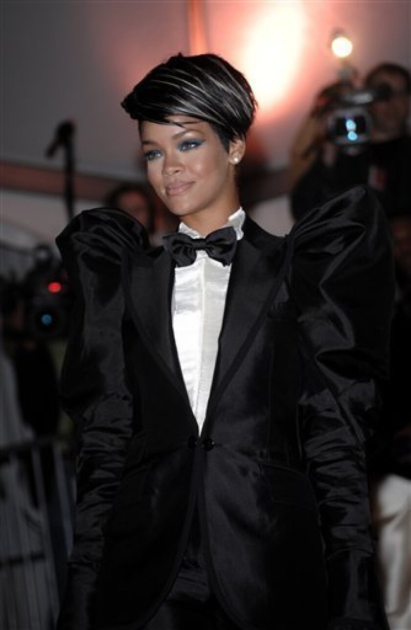 Rihanna arrives at the Metropolitan Museum of Art's Costume Institute Gala in New York on Monday May 4, 2009. (AP Photo/Evan Agostini)