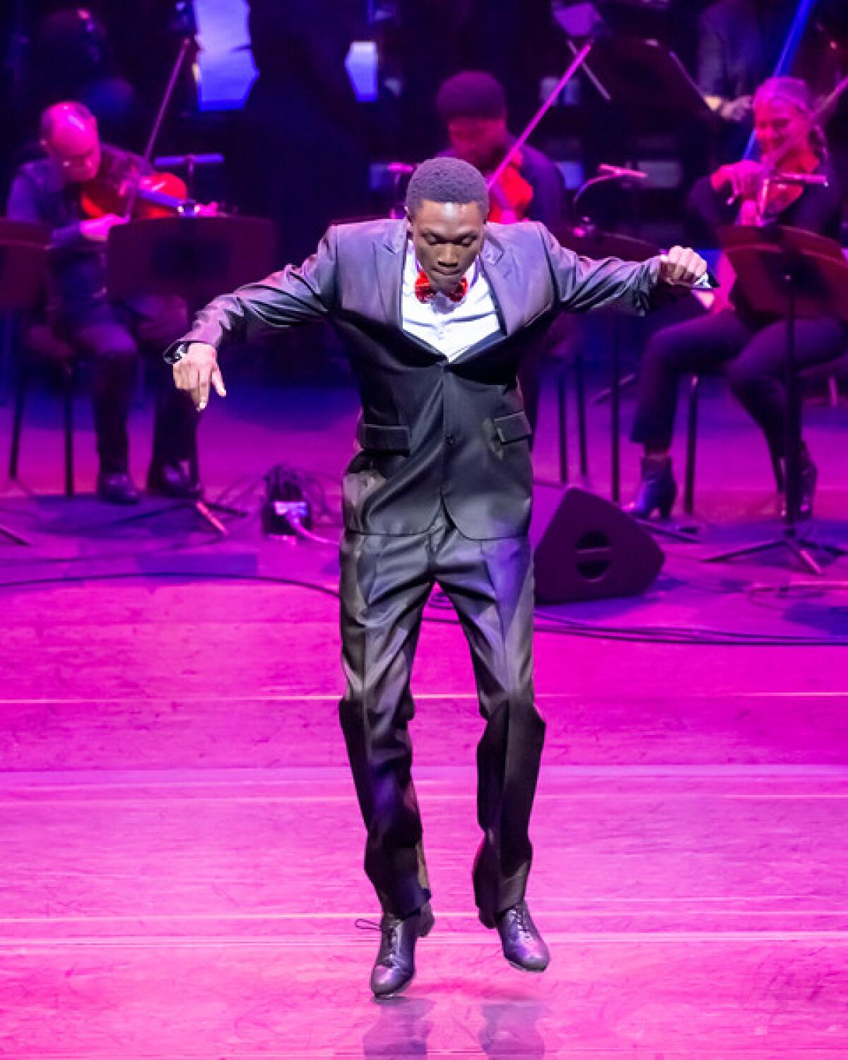 Tap dancer Bakari Anderson at “Gospel Voices of OC” in 2022. The show returns to Musco Center for the Arts on Saturday.