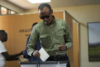 FILE - Rwanda's President Paul Kagame casts his vote in a presidential election, in Kigali, July 15, 2024. (AP Photo/Brian Inganga, File)