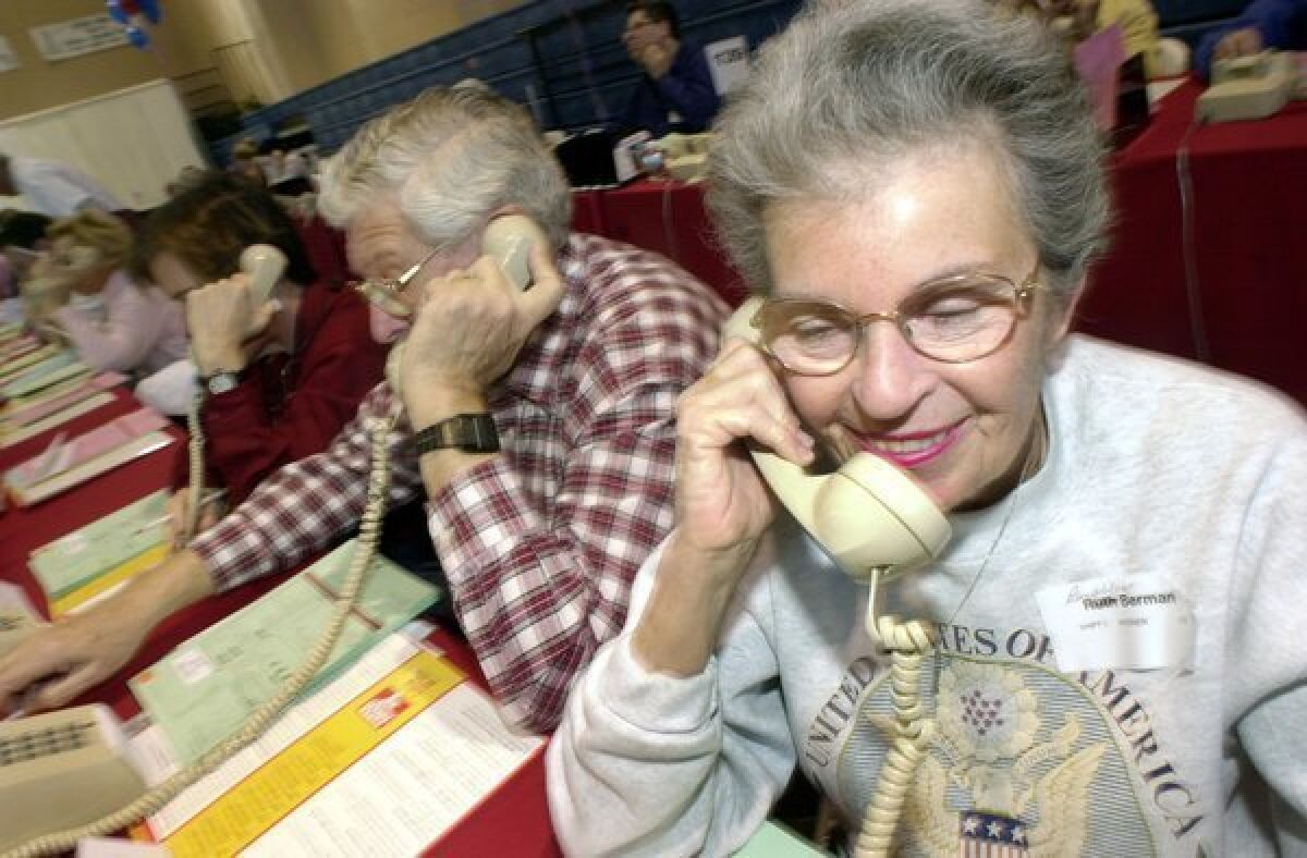 Bubbles Berman and her husband, Len, call people for a Jewish Federation fundraising drive in 2002 in West Hills.