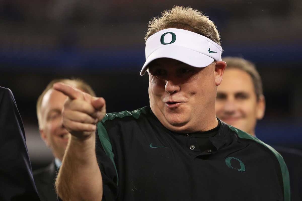 Oregon coach Chip Kelly celebrates the Ducks' win over Kansas State at the Fiesta Bowl.