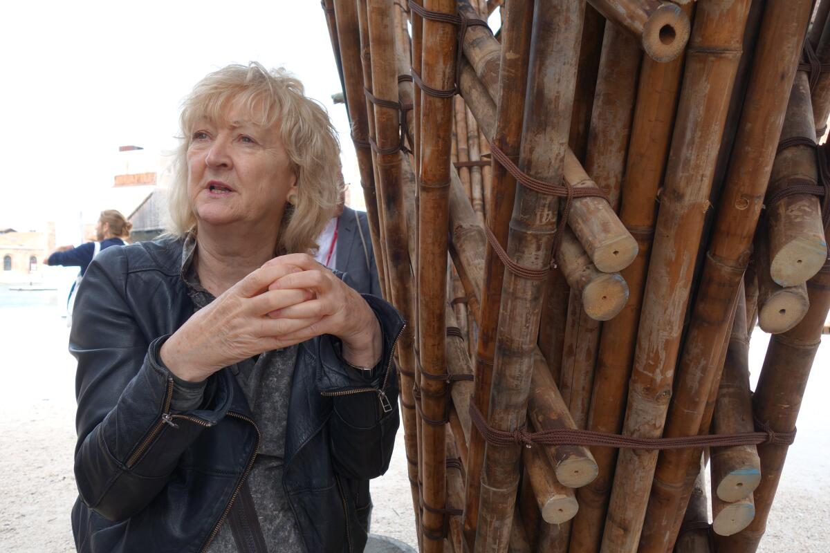 Yvonne Farrell leads journalists on a walk-through of the Venice Architecture Biennale in 2018.