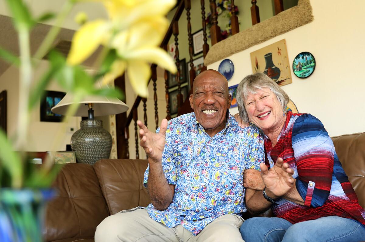 Janice and Charles Tyler laugh together.