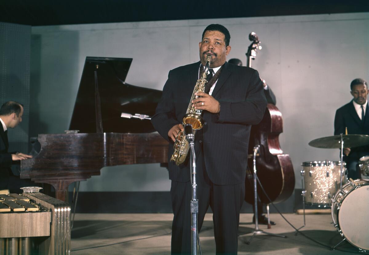 Jazz saxophonist Julian "Cannonball" Adderley performs onstage with his quintet in circa 1962.
