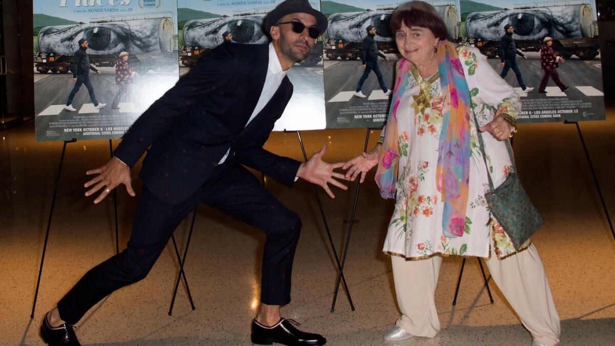 French artist JR, left, and director Agnes Varda attend the premiere of "Faces Places" at the Pacific Design Center.