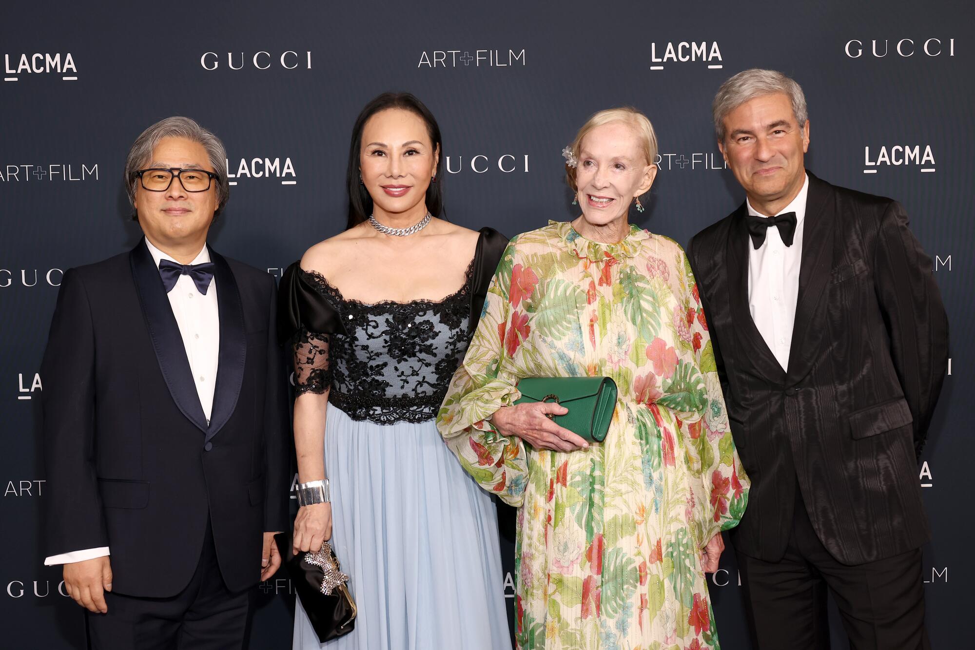 Honoree Park Chan-wook, Eva Chow, Honoree Helen Pashgian and LACMA director Michael Govan pose in formalwear.