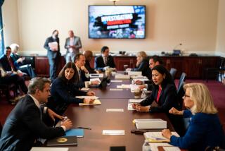 WASHINGTON, DC - JULY 27: Members of the House select committee investigating the deadly pro-Trump invasion of the U.S. Capitol meet in a room ahead of the first hearing in the Cannon House Office Building on Capitol Hill on Tuesday, July 27, 2021 in Washington, DC. During its first hearing, the committee - which currently made up of seven Democrats and two Republicans - will hear testimony from law enforcement officers about their experiences while defending the Capitol on January 6. (Kent Nishimura / Los Angeles Times)