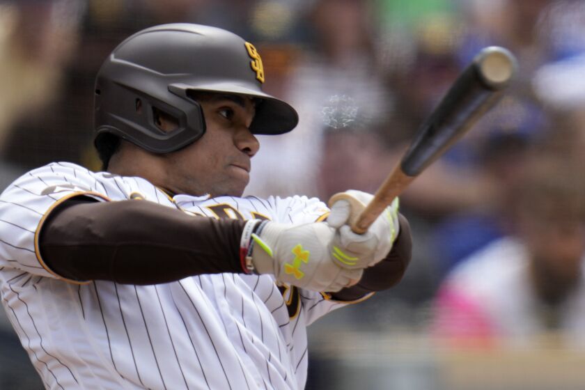 San Diego Padres' Juan Soto hits a two-RBI single during the fifth inning of a baseball game against the Seattle Mariners, Wednesday, June 7, 2023, in San Diego. (AP Photo/Gregory Bull)