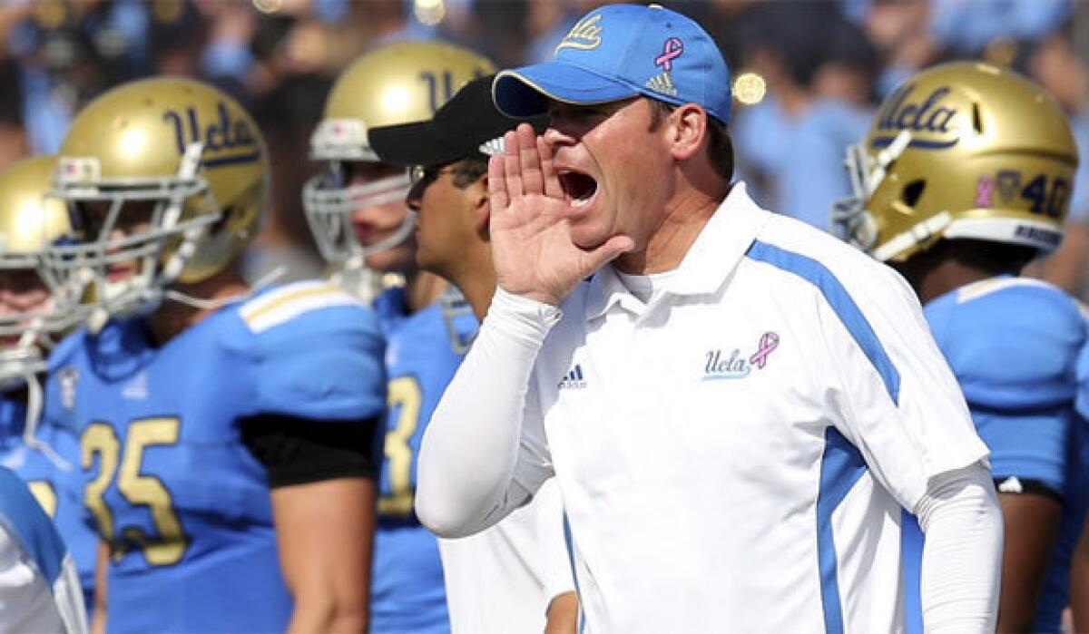 Coach Jim Mora's UCLA Bruins play the USC Trojans on Saturday at the Rose Bowl.