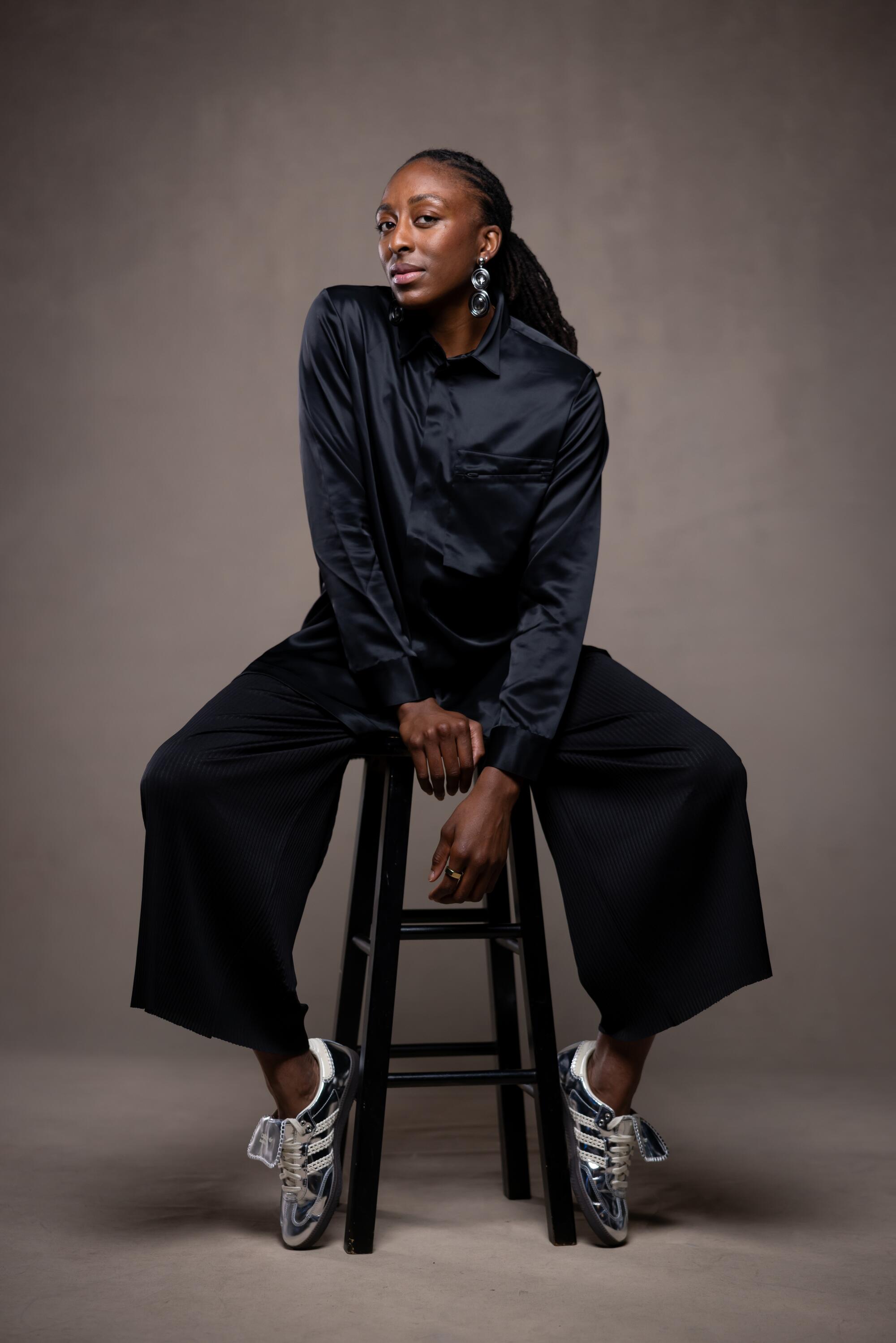 Nneka Ogwumike sits on a stool and is photographed at the Los Angeles Times in El Segundo