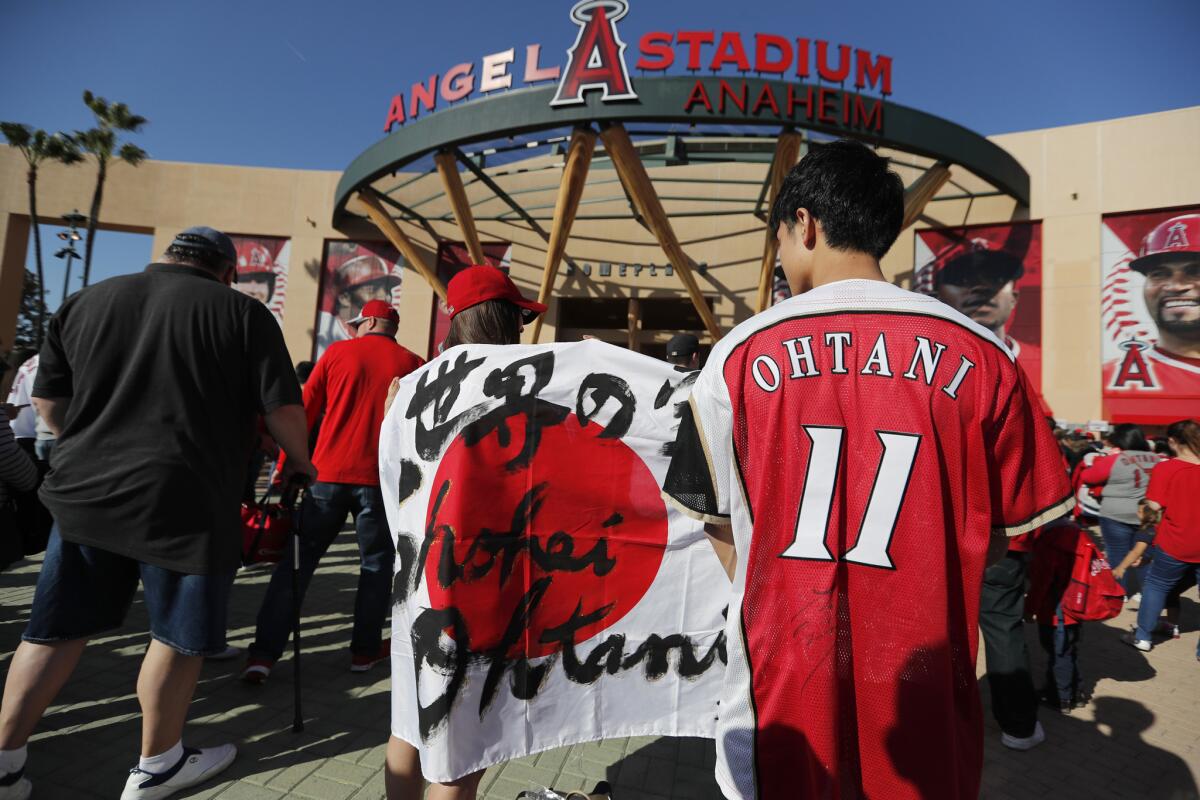 Shohei Ohtani fans show walk into Angel Stadium before a game in April 2018.