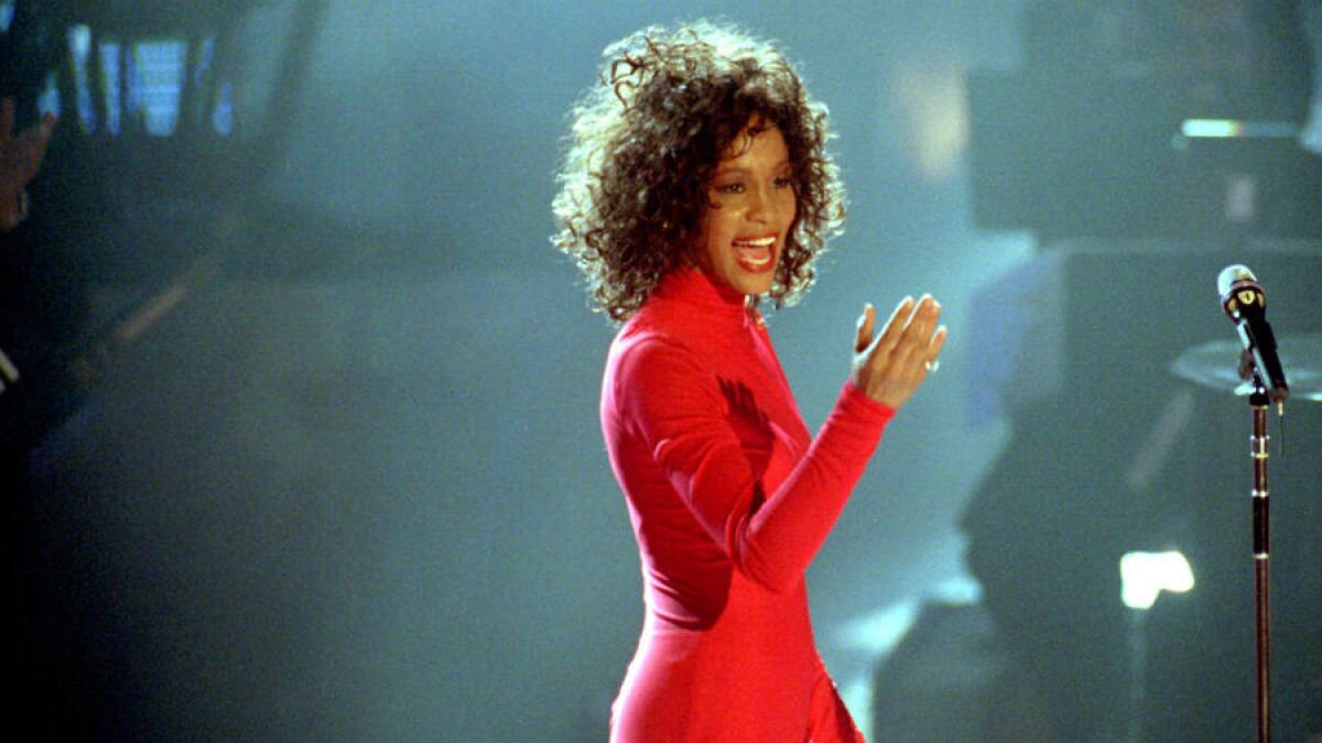 Whitney Houston shown performing in 1993, around the time she was touring behind "The Bodyguard" soundtrack.