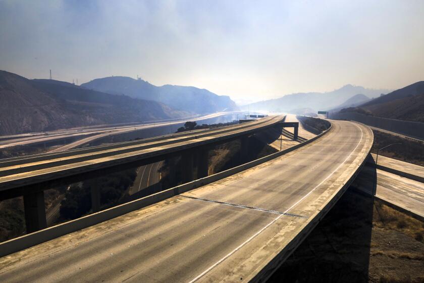 NEWHALL, CA - OCTOBER 11, 2019 — Freeway 5 and 14 are closed to traffic through Newhall Pass due to Saddle Ridge fire in on Friday October 11, 2019 Newhall. (Irfan Khan/Los Angeles Times)