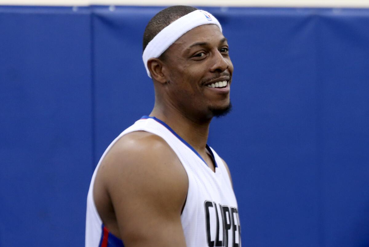 Clippers forward Paul Pierce, acquired as a free agent this off-season, smiles during media day on Friday.
