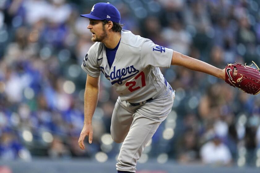 Los Angeles Dodgers starting pitcher Trevor Bauer works against the Colorado Rockies.