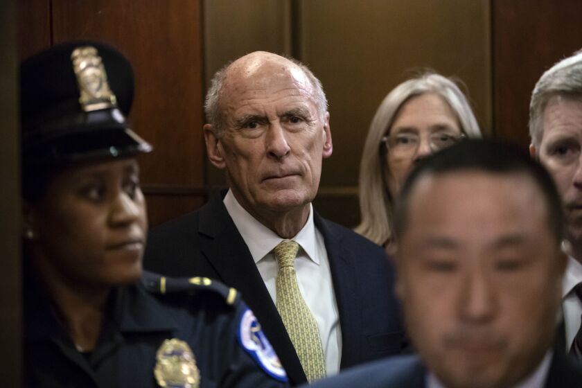 Director of National Intelligence Dan Coats arrives as House and Senate lawmakers from both parties gather for a classified briefing in a secure room about the federal investigation into President Donald Trump's 2016 campaign, on Capitol Hill in Washington, Thursday, May 24, 2018. (AP Photo/J. Scott Applewhite)