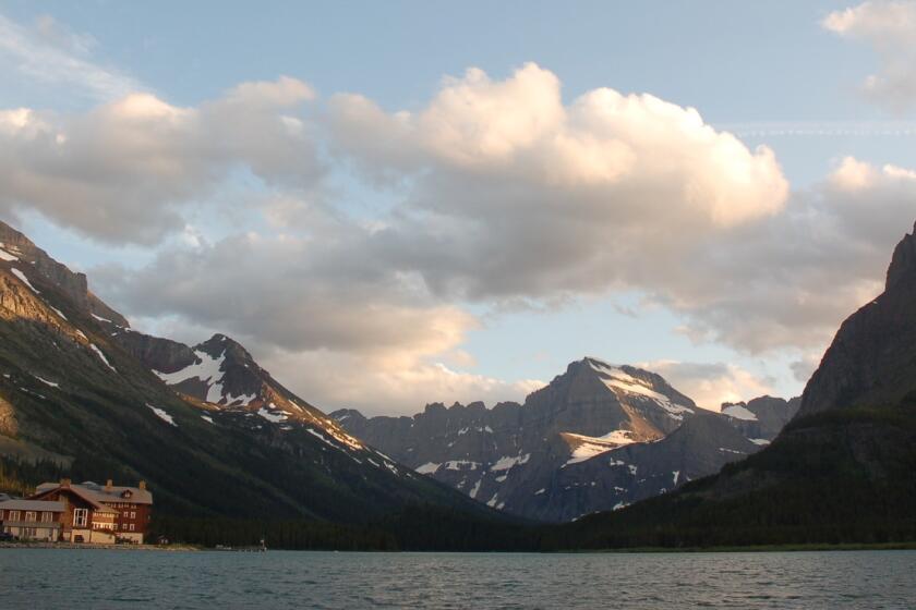 In Montana, Glacier National Park's Many Glacier Hotel looks out upon Swiftcurrent Lake. For a more intimate overnight, there's the Lake McDonald Lodge.