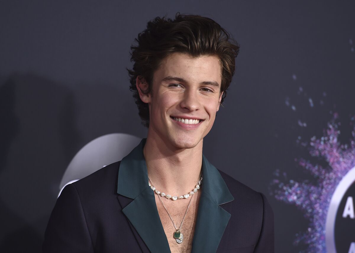 FILE - Shawn Mendes appears at the American Music Awards in Los Angeles on Nov. 24, 2019. The 23-year-old performer released an emotional single, “When You’re Gone, reflecting on his breakup with Camila Cabello. (Photo by Jordan Strauss/Invision/AP, File)