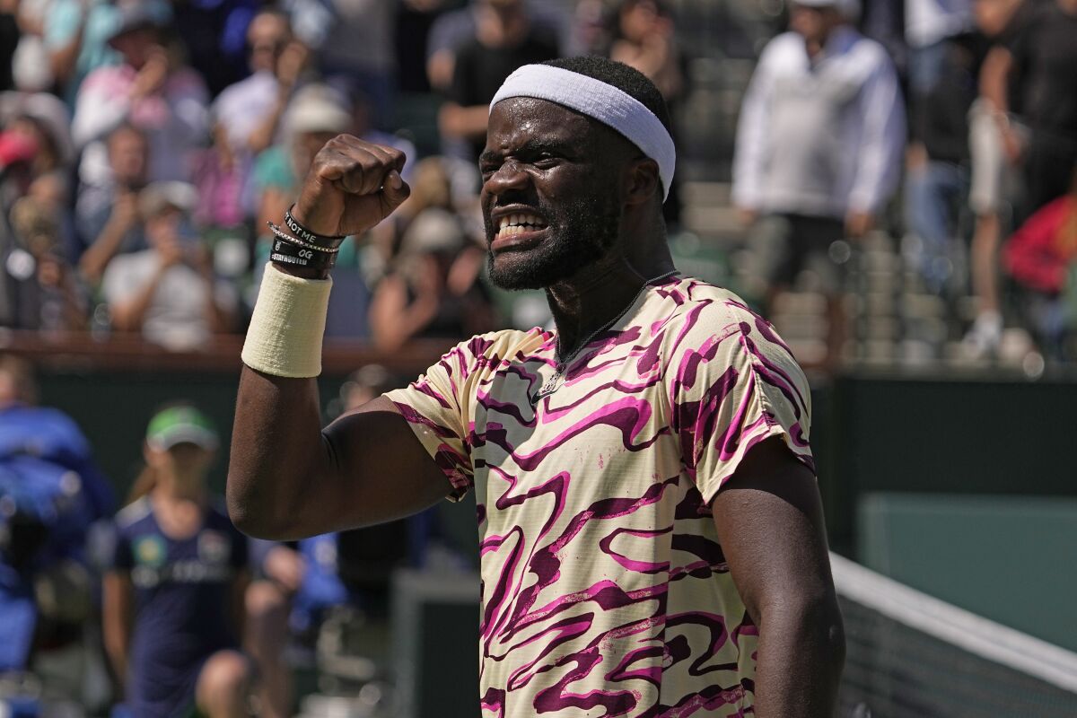 Frances Tiafoe reacts after winning his match against Cameron Norrie at the BNP Paribas Open.