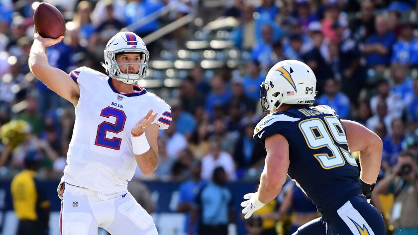 Nathan Peterman throws a pass during the first quarter against the Los Angeles Chargers at StubHub Center.