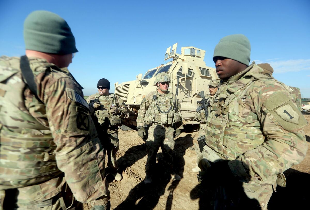 U.S. troops training Iraqi soldiers. 