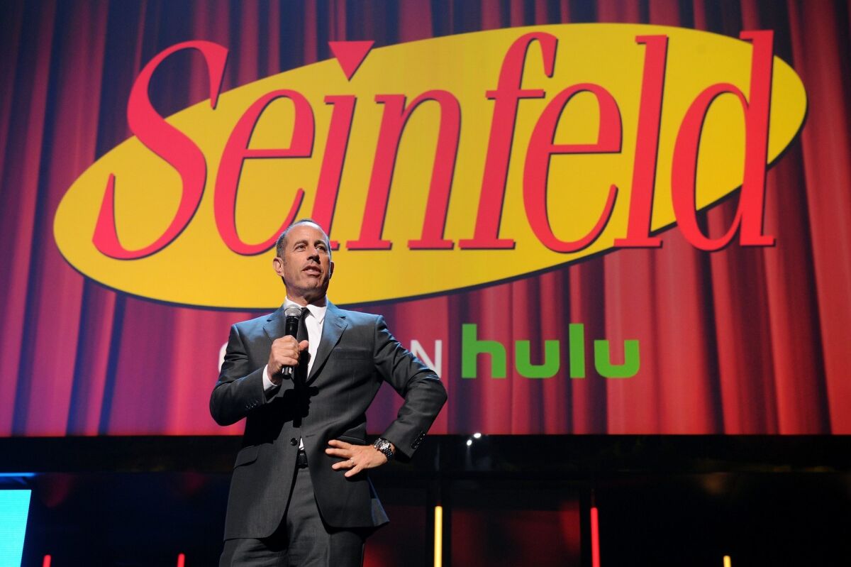 Jerry Seinfeld speaks at the Hulu Upfront in April. All 180 episodes of "Seinfeld" became available to stream on Hulu on Wednesday.