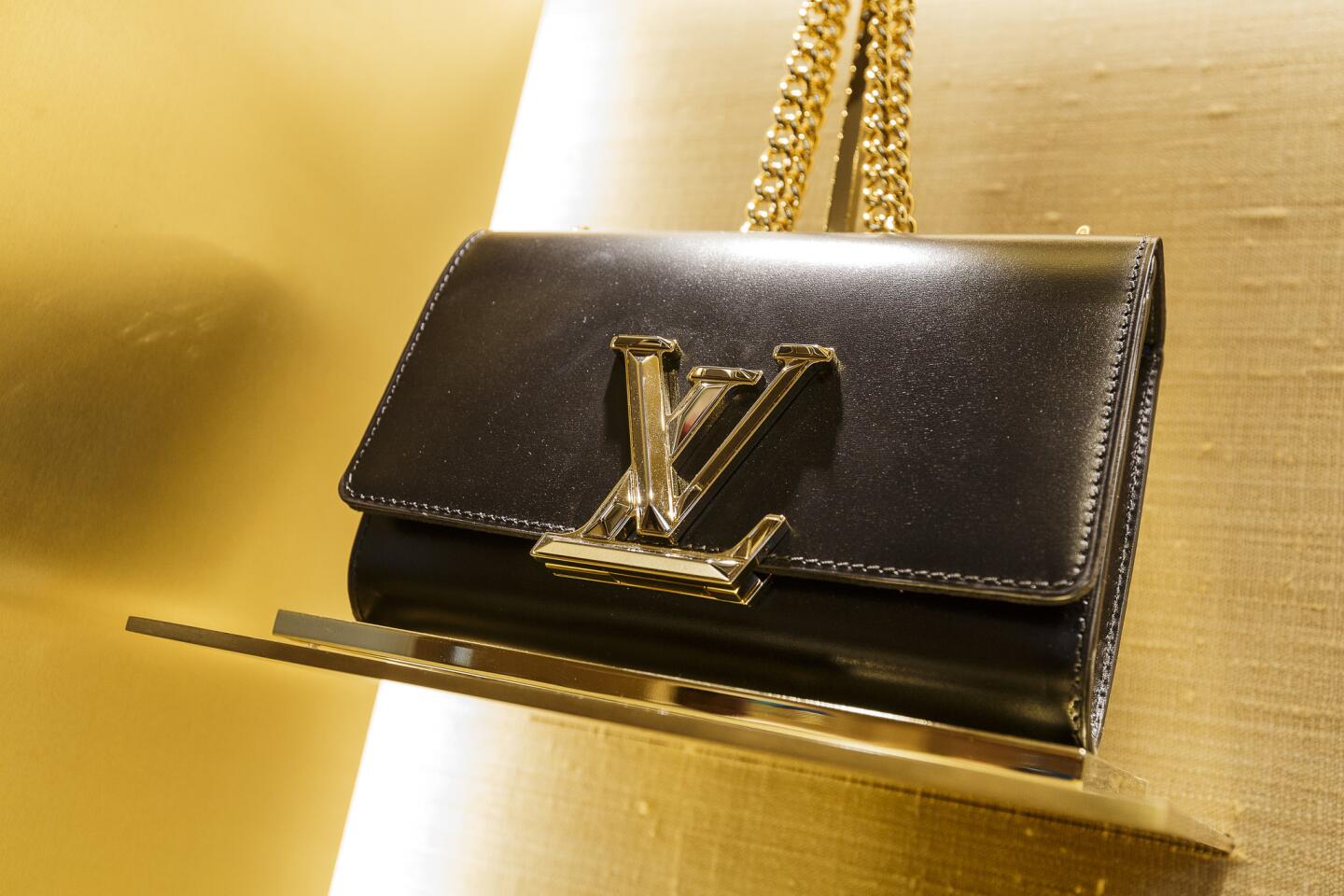 Louis Vuitton Louise Clutch Gold - THE PURSE AFFAIR