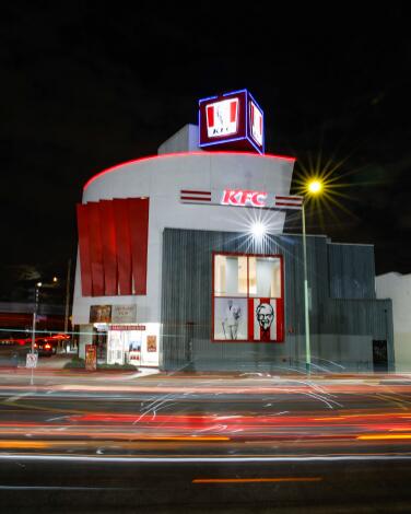 A KFC building at nighttime.
