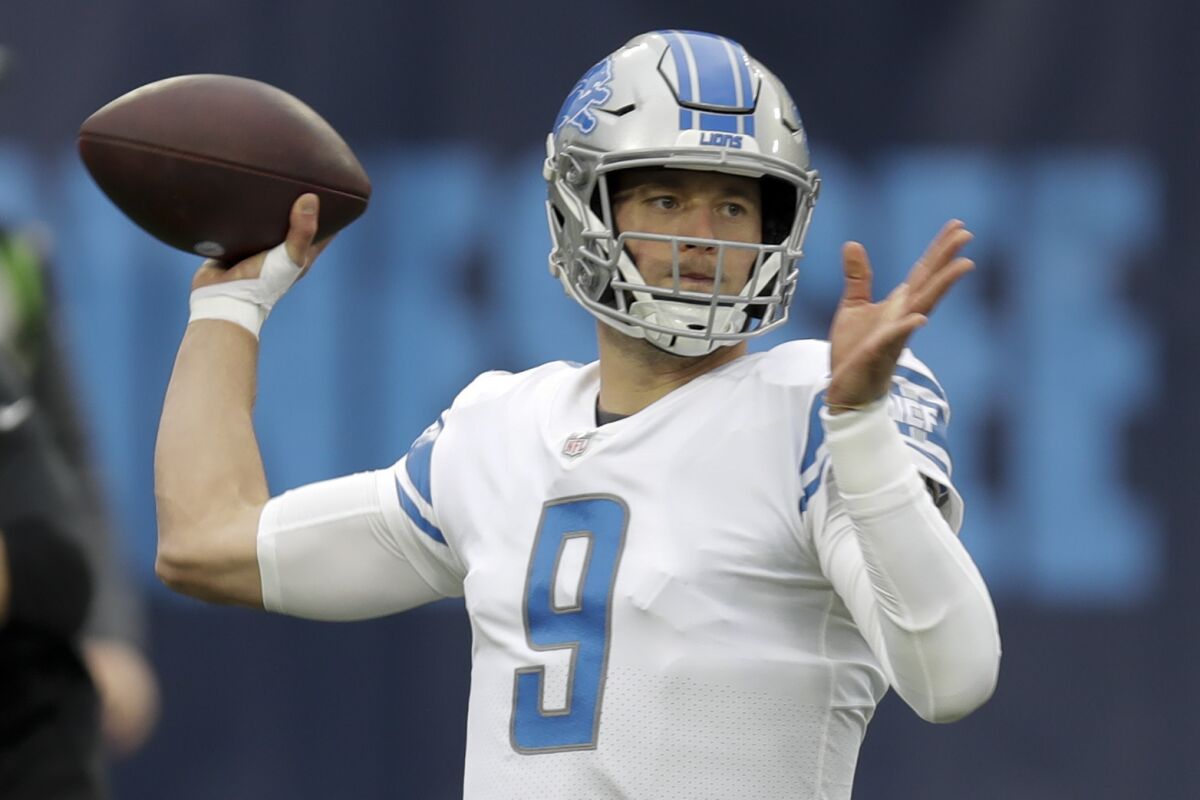 Detroit Lions quarterback Matthew Stafford warms up before a game against the Tennessee Titans.