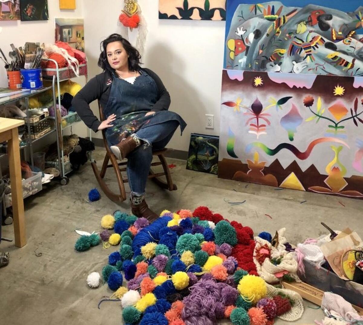 Painter and fiber artist Katie Ruiz, who lives in Normal Heights, is asking the public's help during quarantine to make pom-poms for an installation project at the Oceanside Museum of Art.