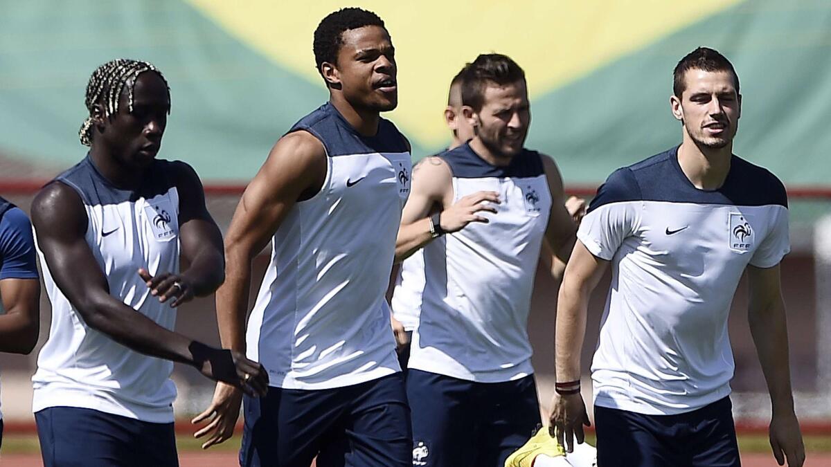 Players on France's World Cup team take part in a training session in Brasilia, Brazil, on Sunday.