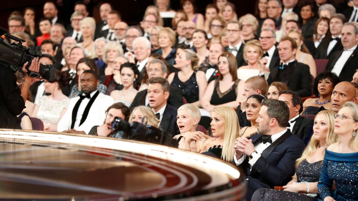 The stunned audience after "La La Land" was found to have been mistakenly announced as best picture over "Moonlight" at last year's Academy Awards.