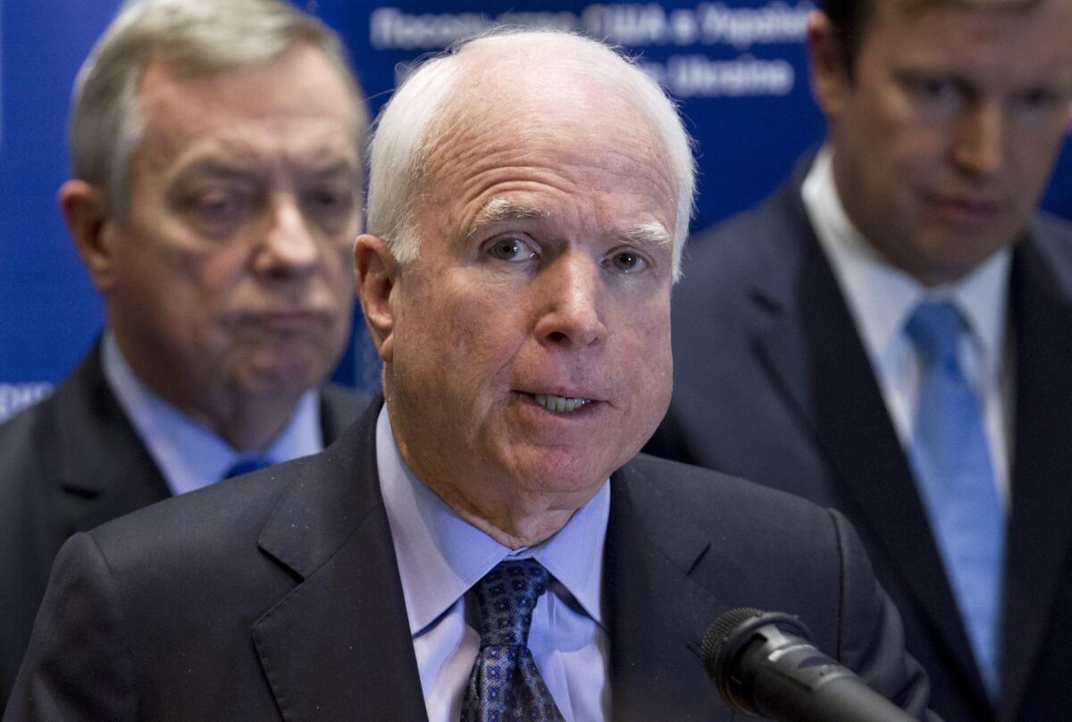 Sen. John McCain (R-Ariz.) speaks during a news conference in Kiev, Ukraine, this month.