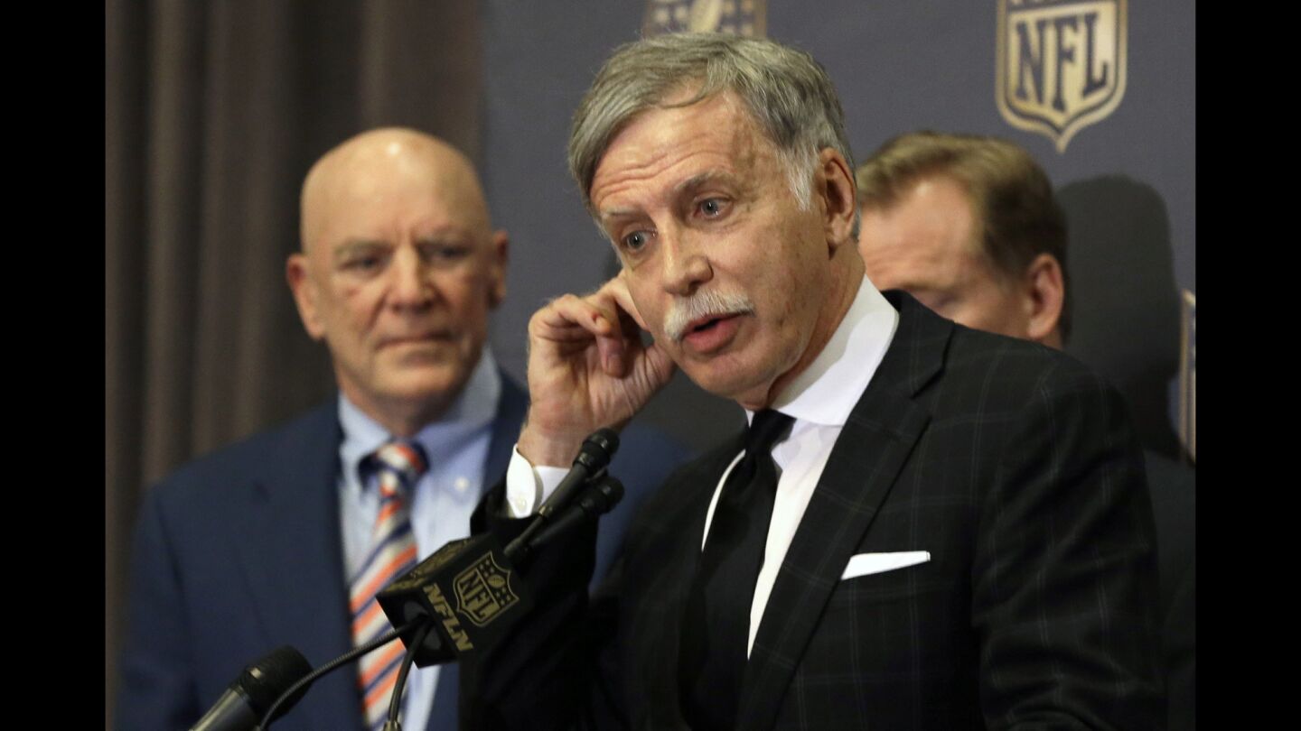 St. Louis Rams owner Stan Kroenke talks to reporters after NFL team owners, meeting in Houston, voted Jan. 12 to allow the Rams to move to a new stadium in Inglewood.
