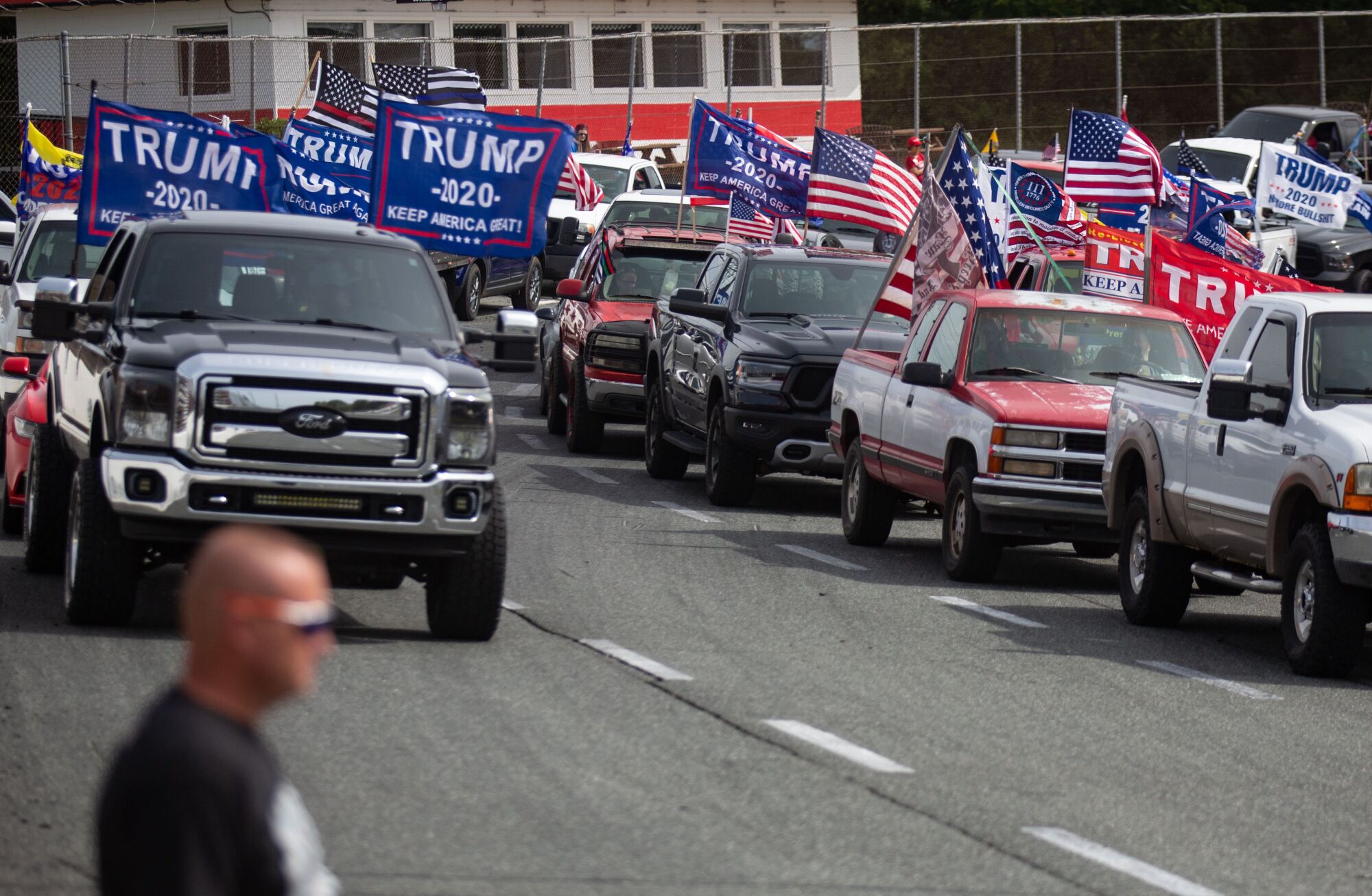 Hundreds of Trump supporters line their vehicles up on the track at Ace Speedway for a Trump rally  in Elon, NC. 
