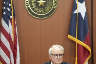 FILE - Judge David Peeples prepares to listen to arguments in a hearing about the November Harris County elections at Harris County Civil Courthouse on Aug. 1, 2023, in Houston. A Texas judge has denied a Republican effort to overturn election results in the nation’s third-most populous county, a Democratic stronghold that’s been beset by GOP efforts to dictate how ballots are cast. (Elizabeth Conley/Houston Chronicle via AP, File)