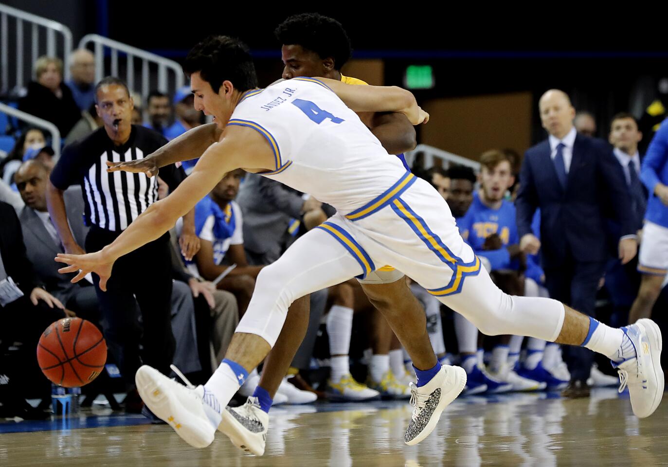 Bruins guard Jaime Jaquez Jr. steals the ball fro San Jose State forward Christian Anigwe.