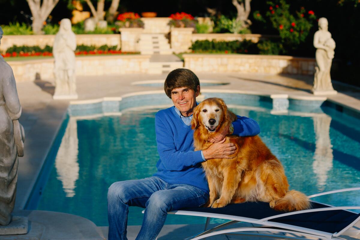Dean Koontz with his beloved golden retriever, Elsa. He is a longtime benefactor of Canine Companions for Independence.