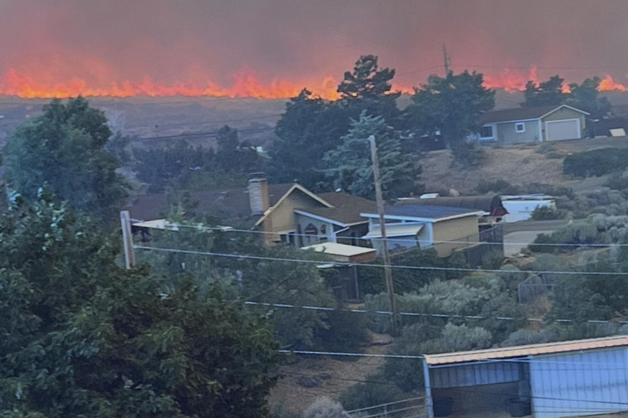 Hawk Fire Reno Hawk fire burns 13,000 acres near Reno, prompting evacuations - Los ...