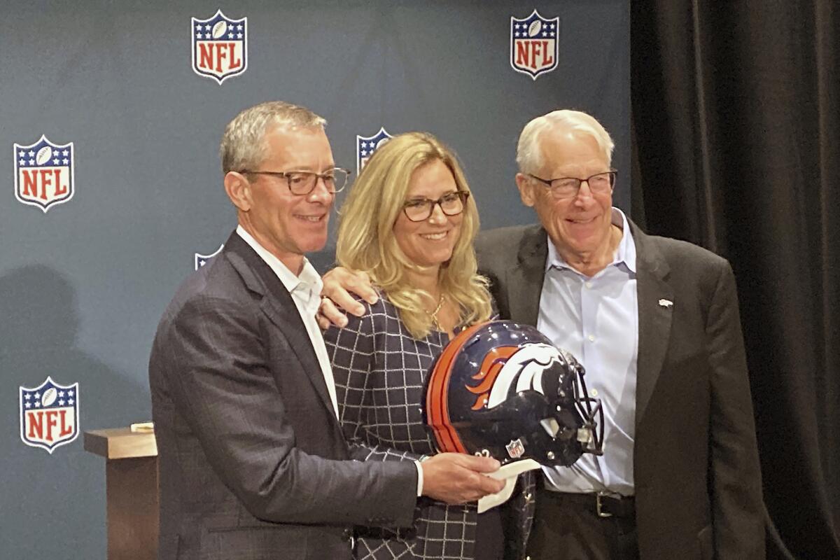 Broncos sale to group led by Rob Walton approved by NFL owners