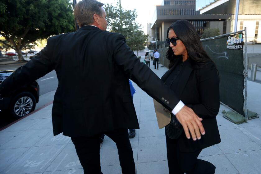 LOS ANGELES, CALIF. - AUG. 10, 2022. Vanessa Bryant, the widow of Lakers superstar Kobe Bryant, leaves the U.S. Courthouse in downtown Los Angeles on Wednesday, Aug. 9, 2022. She is suing the county for graphic photos taken by first responders at the scene of the helicopter crash that killed her husband. (Luis Sinco / Los Angeles Times)