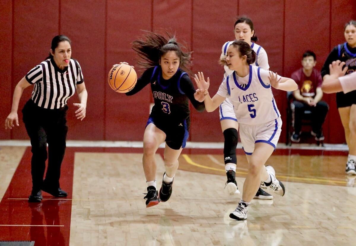 Poly guard Hannah Lising dribbles Saturday against LACES in the City Section Division 1 title game.