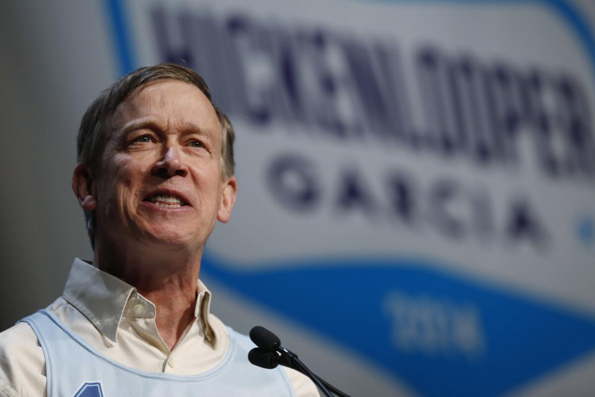 Colorado Gov. John Hickenlooper told a sheriffs' group that he did not fully vet gun-control bills that he signed into law.