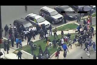 Raw: Protesters and Police clash in Baltimore