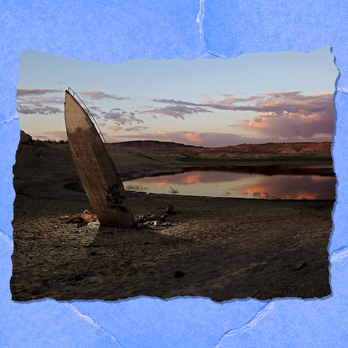 A boat protrudes upward from mud in a nearly dry lake bed.